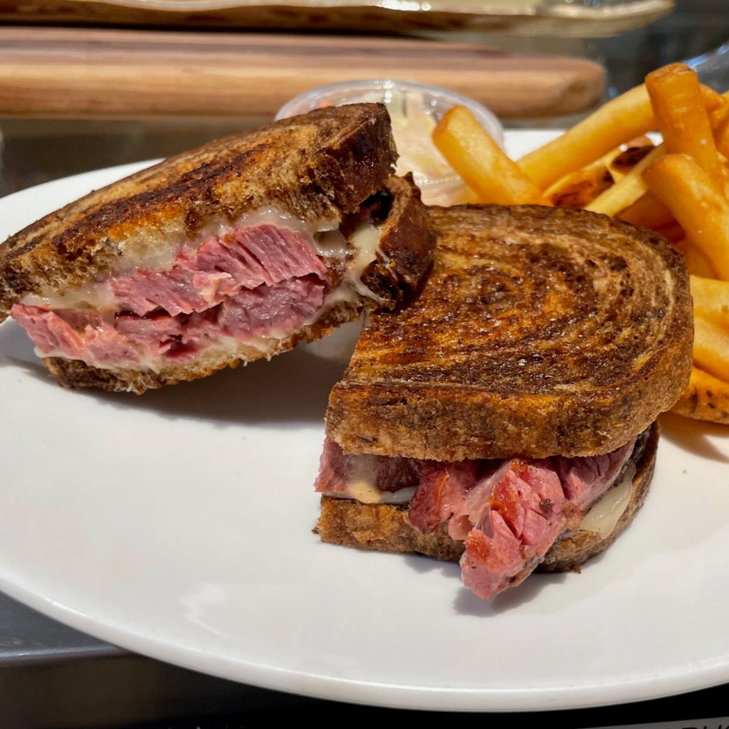 Corned Beef SDWCH on Marble Rye, Marinated Slaw Topper + 1 Side