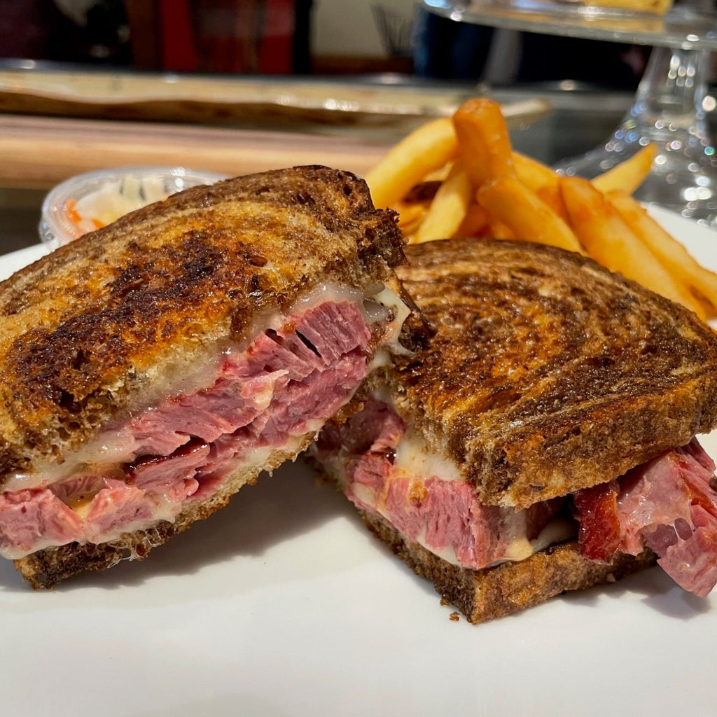 Corned Beef SDWCH on Marble Rye, Marinated Slaw Topper + 1 Side